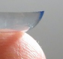 The edge of contact lens in the correct position rounds out like a bowl.
