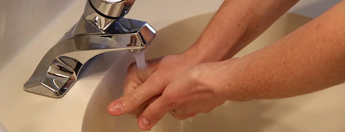 Hand washing before inserting contact lenses